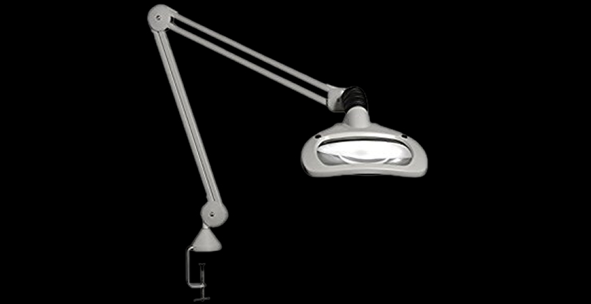 Adjustable desk lamp with a clamp mount on a black background.