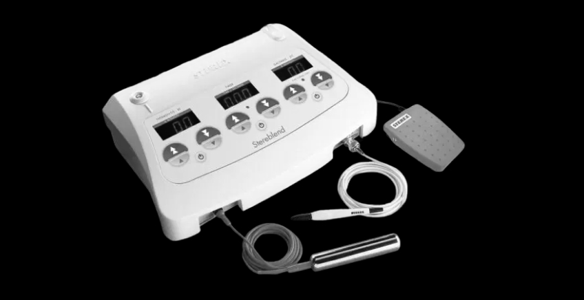Electrical stimulation therapy device with control panel, wand, and foot pedal on black background.