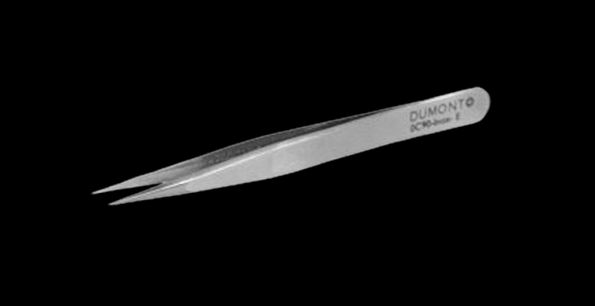 Dumont brand precision microtweezers with fine curved tips on a black background